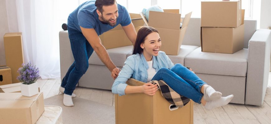 Couple with Moving Boxes